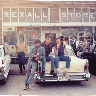 Ralph Macchio, Matt Dillon, and C. Thomas Howell outside the Rexall Drugstore in Sperry