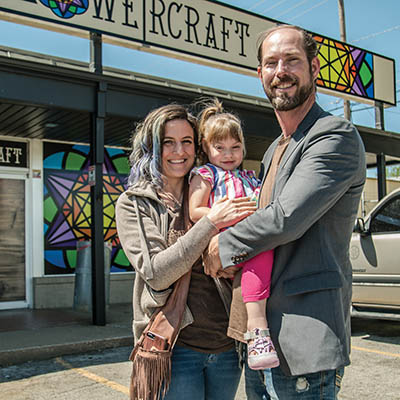 FlowerCraft owners Lauren and Shawn Jenkins with their daughter Lyra