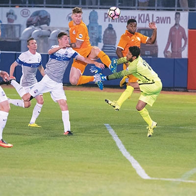 At photo’s center, defender Francisco Ugarte, 2018 Roughnecks captain