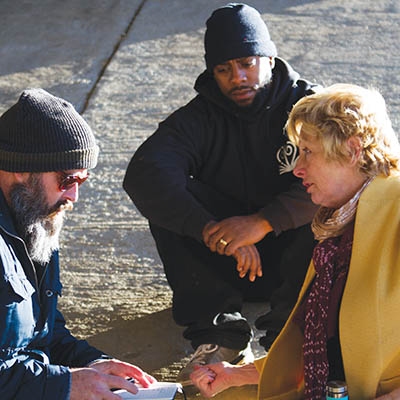 Beau Adams, Iron Gate executive director Connie Cronley, and director of operations Matt Mitchell