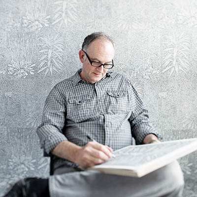 Gary Kachadourian, Tulsa Artist Fellow from Baltimore, MD, in his drawing studio at AHHA