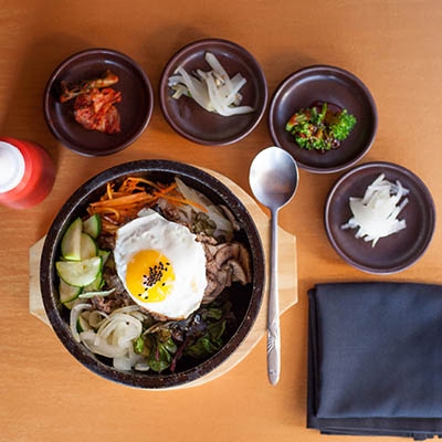 From left, traditional-style seating and Bibimbap with beef