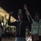 Protesters move to Denver Avenue, blocking traffic for about an hour on Wednesday night.