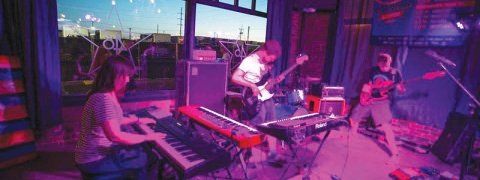 And There Stand Empires performs during Center of the Universe Festival. From left: Julia Hangs, Daniel Sutliff, Hank Hanewinkel III (partially pictured) and James Plumlee